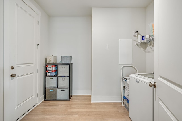 2108 Royal Tern St, Panama City, FL 32405 - clothes washing area featuring laundry area, washer / dryer, baseboards, and light wood-style floors