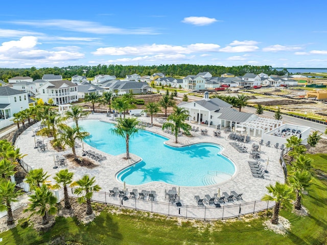 2108 Royal Tern St, Panama City, FL 32405 - community pool featuring a patio, fence, and a residential view