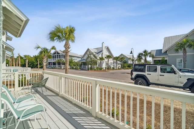128 Wharf Ln Unit A, Inlet Beach, FL 32461 - wooden deck featuring a residential view