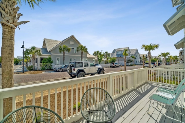 128 Wharf Ln Unit A, Inlet Beach, FL 32461 - wooden terrace with a residential view
