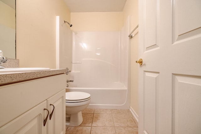 bathroom with toilet, washtub / shower combination, tile patterned flooring, and vanity