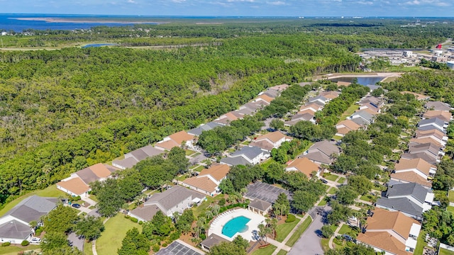 bird's eye view featuring a water view, a residential view, and a view of trees