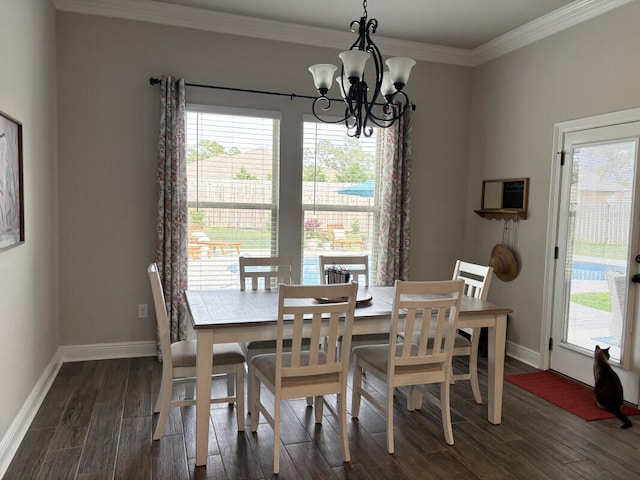 dining room with baseboards, a notable chandelier, ornamental molding, and dark wood-type flooring