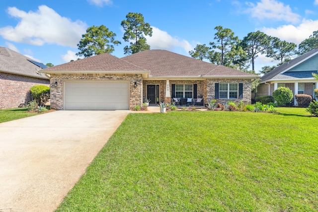 209 Forest Park Dr, Santa Rosa Beach, FL 32459 - view of front of property featuring an attached garage, a front lawn, a porch, and driveway