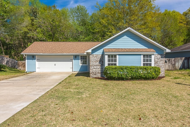 511 Oak Ave, Niceville, FL 32578 - view of front facade featuring an attached garage, driveway, brick siding, and a shingled roof
