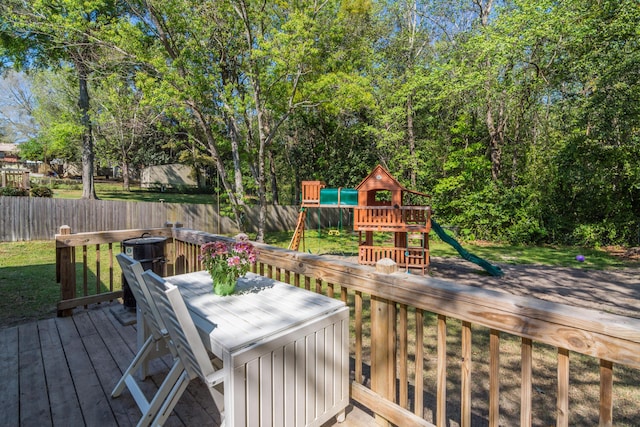511 Oak Ave, Niceville, FL 32578 - deck with a playground and outdoor dining area