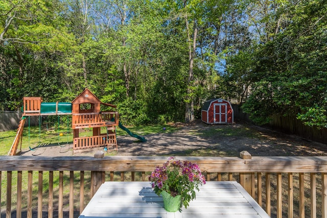 511 Oak Ave, Niceville, FL 32578 - wooden deck with a playground