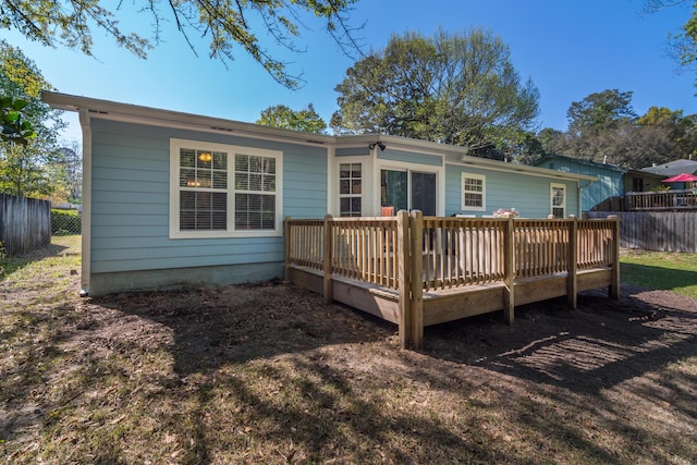 511 Oak Ave, Niceville, FL 32578 - rear view of house with a deck