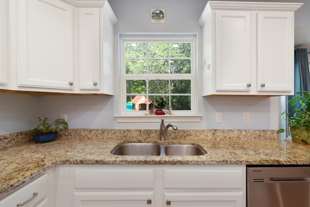 511 Oak Ave, Niceville, FL 32578 - kitchen with dishwasher, a sink, white cabinetry, and light stone counters