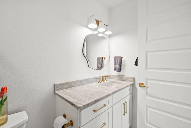 half bath with toilet and vanity