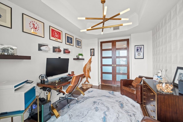 office area featuring a notable chandelier, french doors, visible vents, and wood finished floors