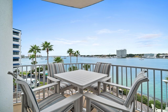 balcony featuring a water view