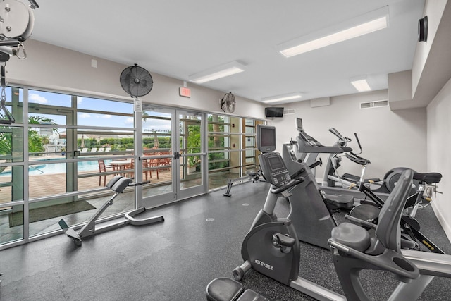 workout area with french doors and visible vents