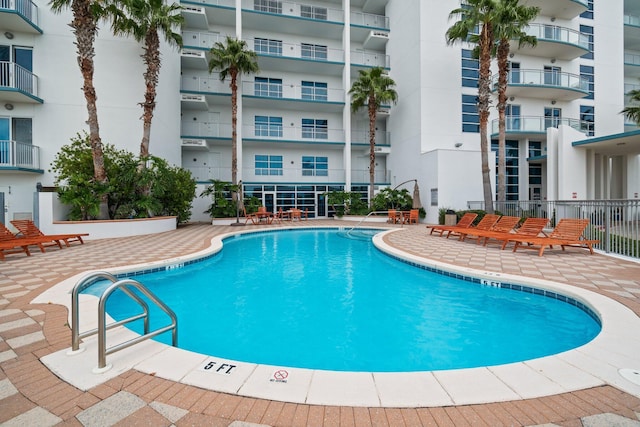 pool with a patio