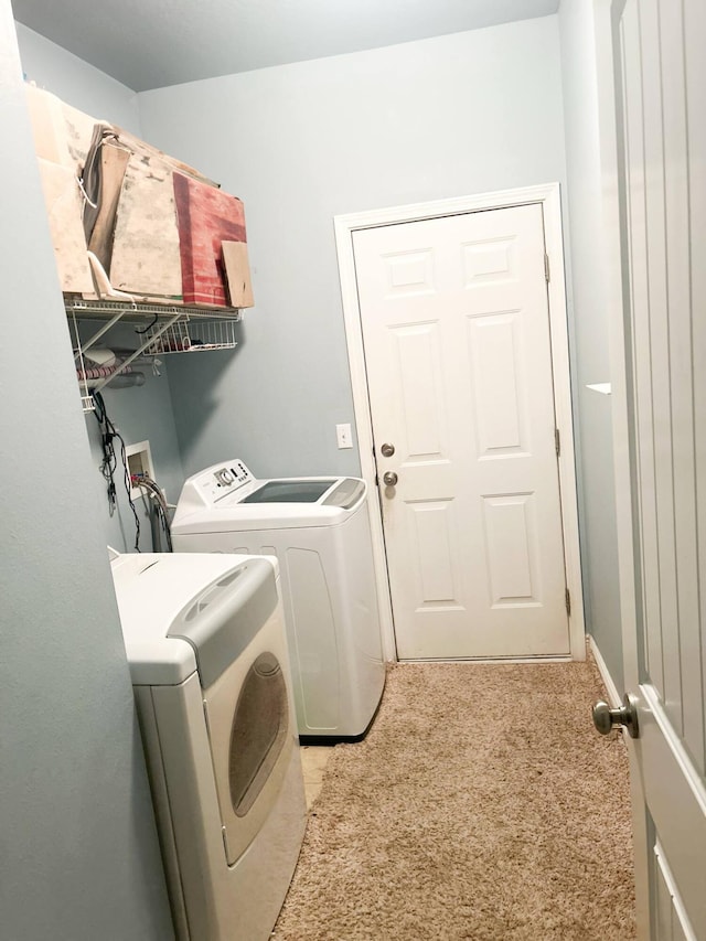 897 Cocobolo Dr, Santa Rosa Beach, FL 32459 - laundry room with washer and dryer and carpet floors