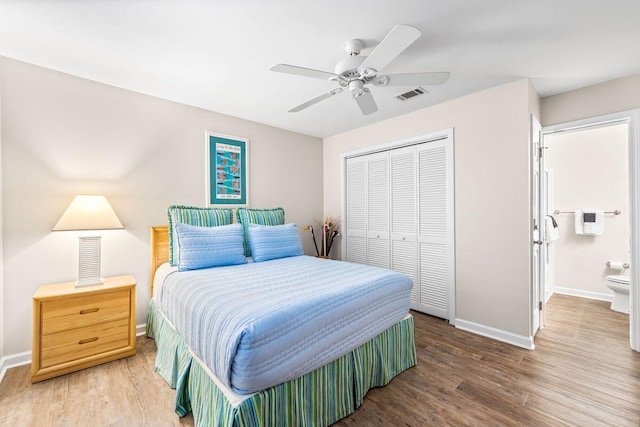 142 Beachside Dr Unit 10, Santa Rosa Beach, FL 32459 - bedroom with a closet, wood finished floors, visible vents, and baseboards
