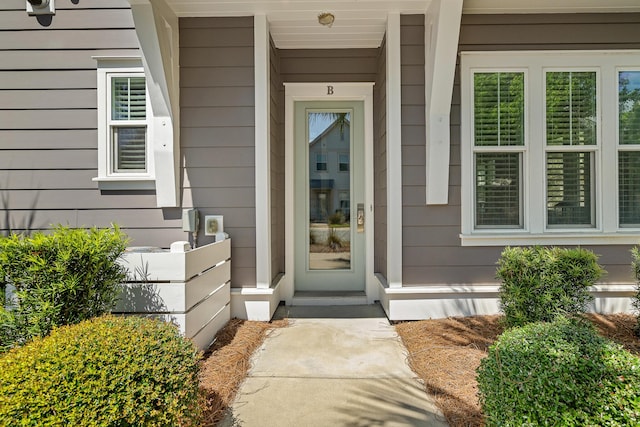 property entrance featuring a porch