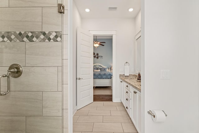 full bathroom with connected bathroom, visible vents, tiled shower, and recessed lighting