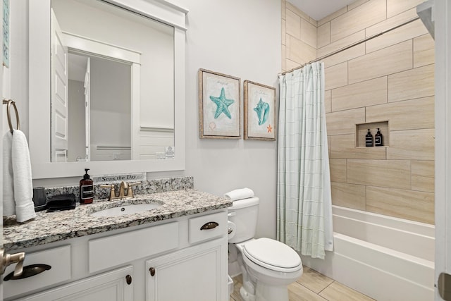 full bathroom featuring vanity, toilet, tile patterned flooring, and shower / bath combo