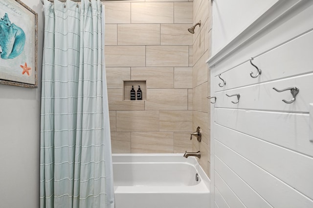 bathroom with shower / bathtub combination with curtain