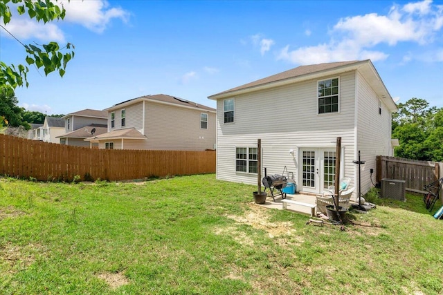 291 Dahlquist Dr, Crestview, FL 32539 - rear view of property featuring french doors, a patio, and central air condition unit