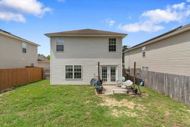 291 Dahlquist Dr, Crestview, FL 32539 - back of property featuring french doors and a patio