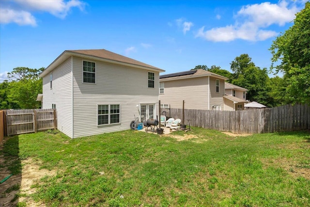 291 Dahlquist Dr, Crestview, FL 32539 - rear view of house with a patio, an outdoor hangout area, and french doors