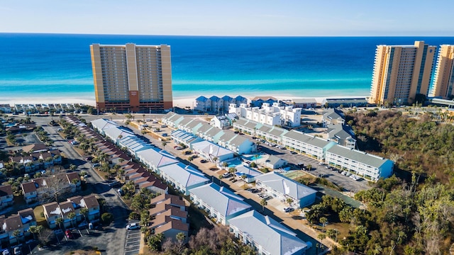 bird's eye view featuring a beach view and a water view