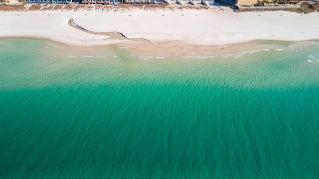 aerial view featuring a water view and a beach view