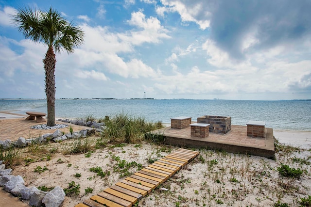 water view with a fire pit