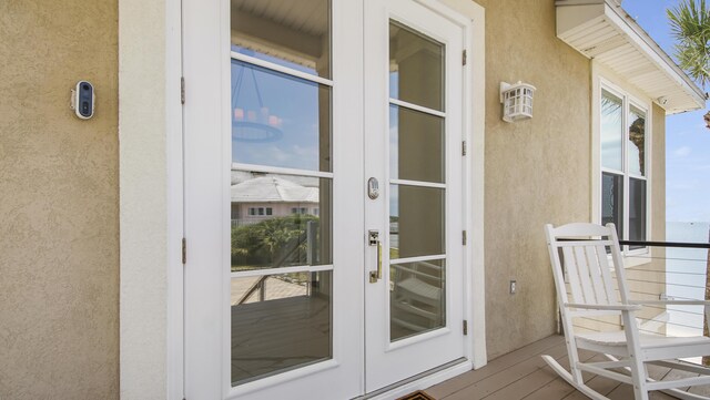 balcony featuring french doors
