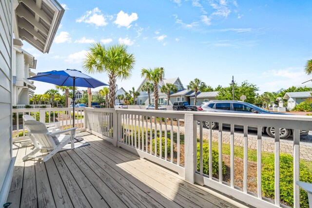 wooden deck with a residential view