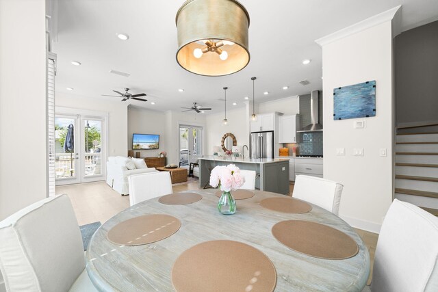 dining area with plenty of natural light, stairway, recessed lighting, and ceiling fan