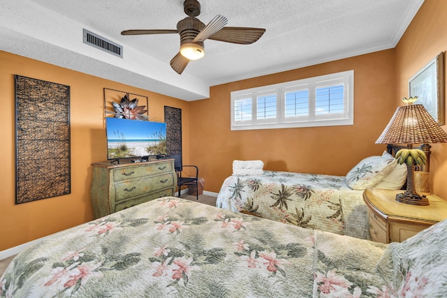 502 Gulf Shore Dr Unit 413, Destin, FL 32541 - carpeted bedroom with a textured ceiling, baseboards, ornamental molding, and ceiling fan