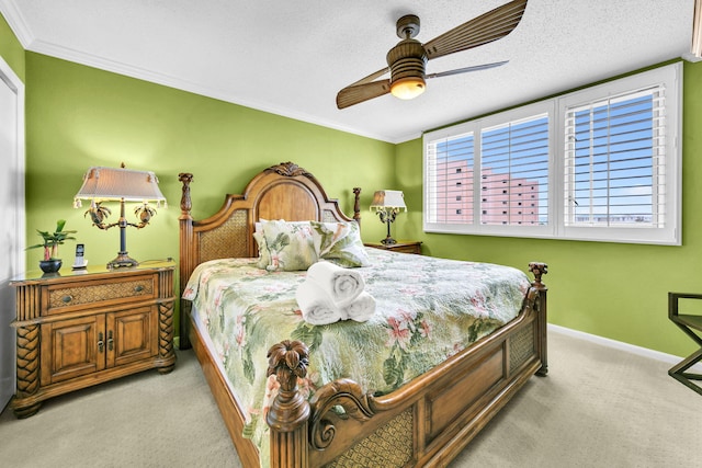 502 Gulf Shore Dr Unit 413, Destin, FL 32541 - carpeted bedroom with crown molding, baseboards, and a ceiling fan