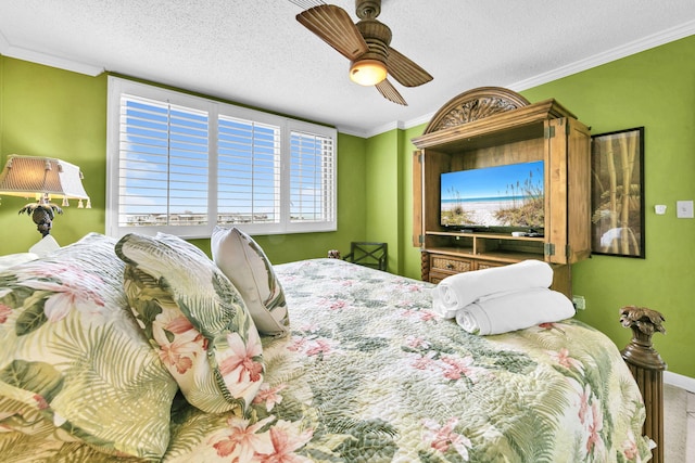 502 Gulf Shore Dr Unit 413, Destin, FL 32541 - carpeted bedroom with ornamental molding, ceiling fan, a textured ceiling, and baseboards