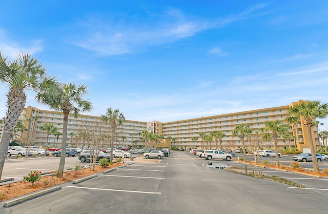 502 Gulf Shore Dr Unit 413, Destin, FL 32541 - view of apartment building / complex featuring uncovered parking