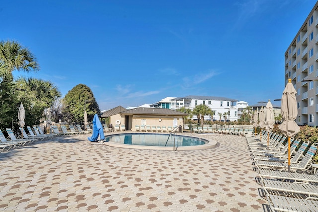 502 Gulf Shore Dr Unit 413, Destin, FL 32541 - community pool with a patio area