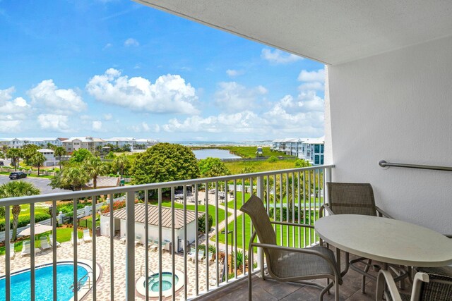 502 Gulf Shore Dr Unit 413, Destin, FL 32541 - balcony with view of pool and a water view