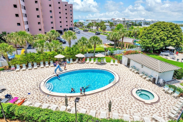 502 Gulf Shore Dr Unit 413, Destin, FL 32541 - community pool featuring a community hot tub