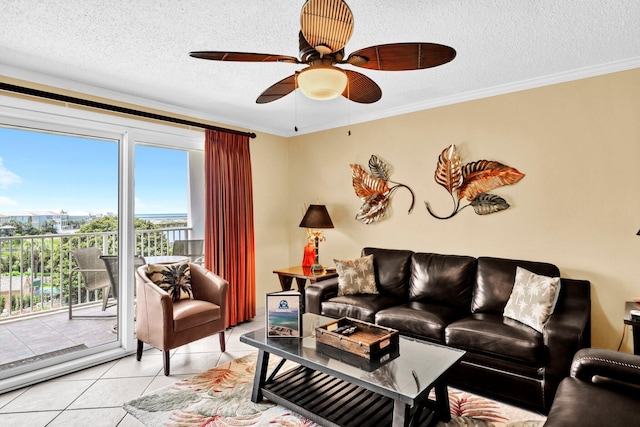 502 Gulf Shore Dr Unit 413, Destin, FL 32541 - living area with a textured ceiling, ceiling fan, light tile patterned flooring, and ornamental molding