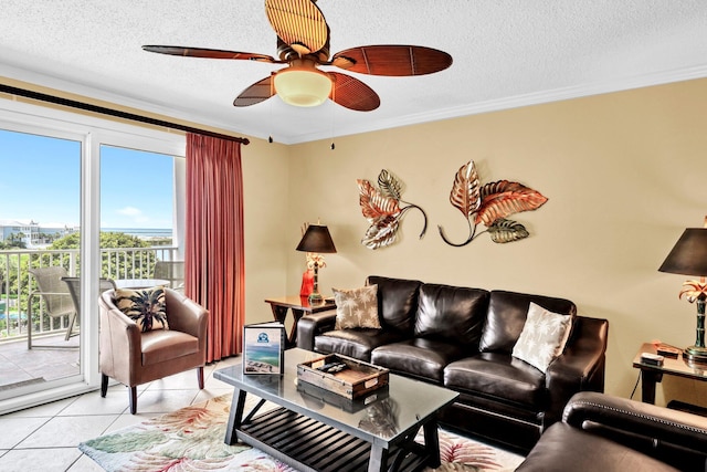 502 Gulf Shore Dr Unit 413, Destin, FL 32541 - living room with ceiling fan, a textured ceiling, ornamental molding, and light tile patterned floors