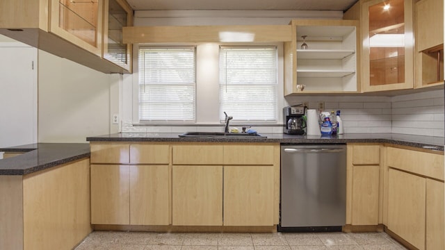 kitchen featuring open shelves, dishwasher, light brown cabinetry, and a sink