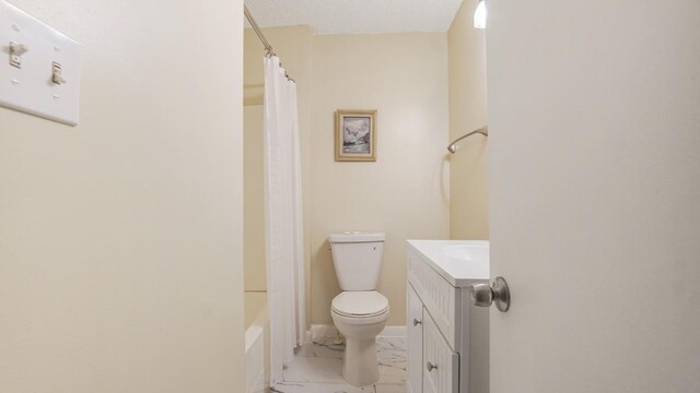 full bath featuring toilet, marble finish floor, and vanity