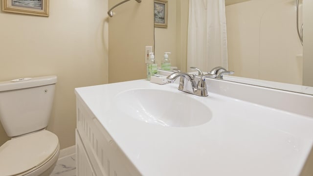 full bathroom featuring vanity, toilet, and marble finish floor