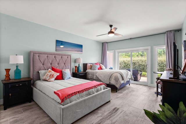 515 Topsl Beach Blvd # 106, Miramar Beach, FL 32550 - bedroom with a ceiling fan, light wood-style flooring, and access to exterior