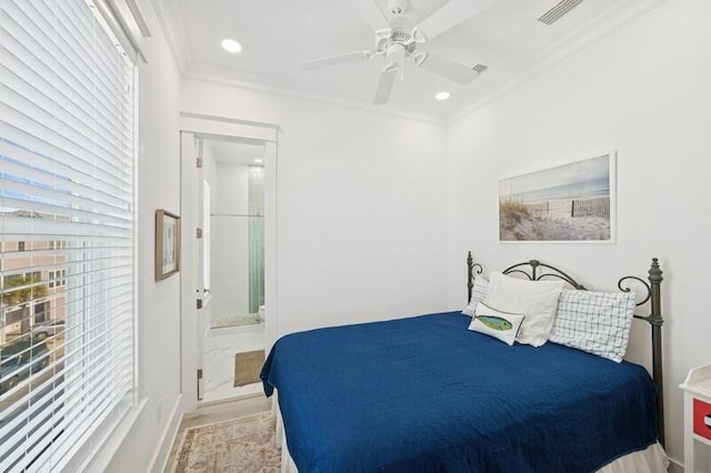 bedroom with crown molding, ensuite bathroom, ceiling fan, baseboards, and recessed lighting