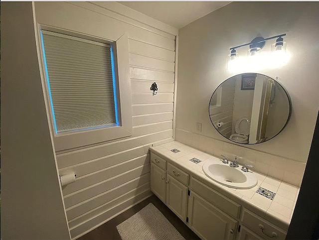 941 Walton Bridge Rd, Ponce De Leon, FL 32455 - bathroom with vanity and tasteful backsplash