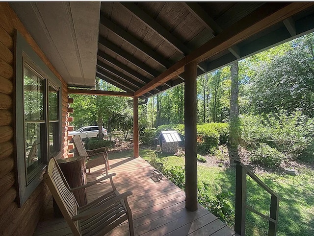 941 Walton Bridge Rd, Ponce De Leon, FL 32455 - wooden deck with a yard