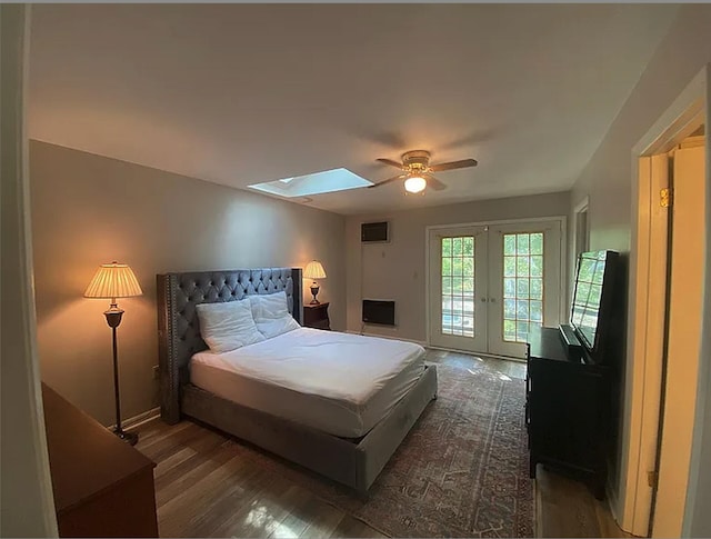941 Walton Bridge Rd, Ponce De Leon, FL 32455 - bedroom featuring a skylight, access to exterior, dark wood-type flooring, french doors, and ceiling fan